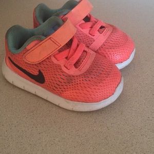 Coral Nike shoes